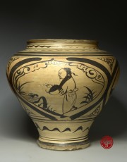 A CIZHOU WARE JAR WITH PAINTED DECORATIONS